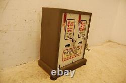VINTAGE 10 CENT AND 25 CENT COUNTER TOP STAMP DISPENSER MACHINE, 14 T x 11.5 W